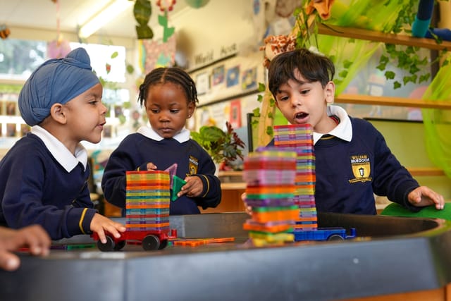 Children Playing with Blocks